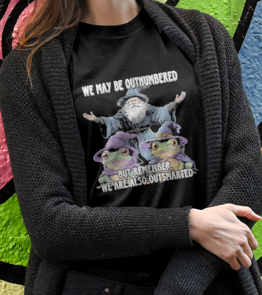 We May Be Outnumbered But Remember We Are Also Outsmarted Wizard And Frogs In Purple Hats Shirt